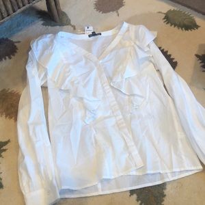 White ruffled blouse